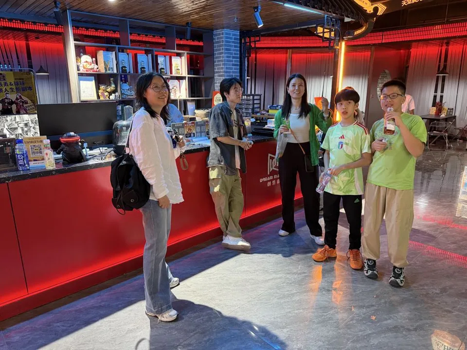 The group gathered in the escape-room lobby