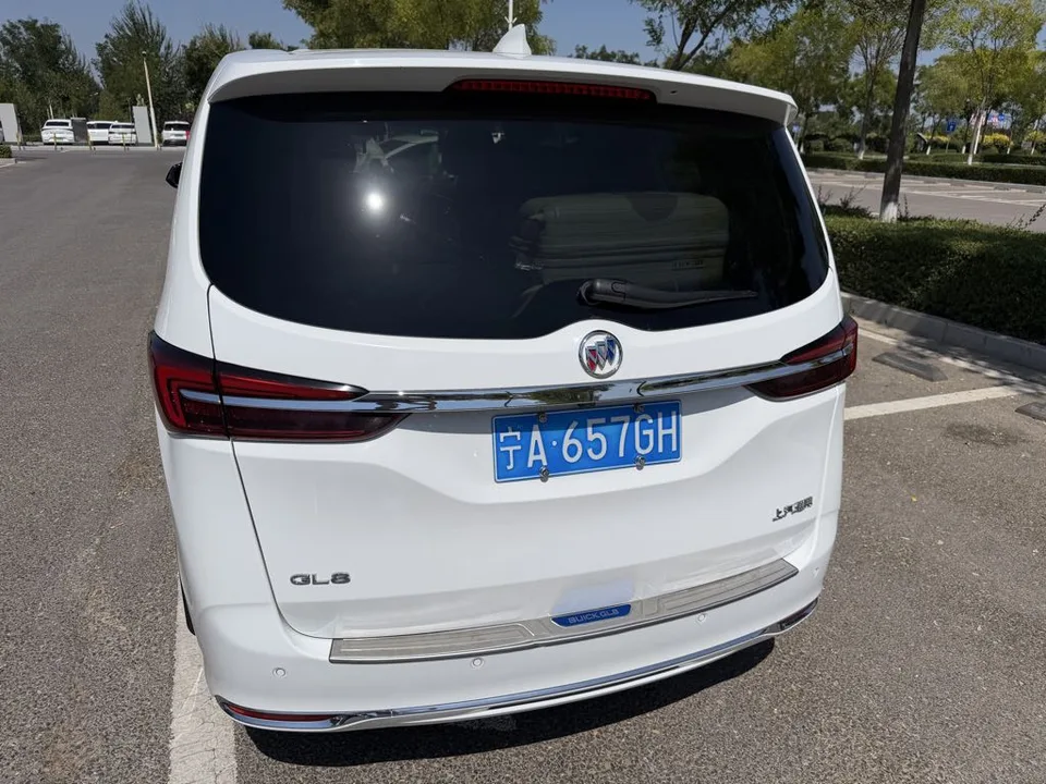 Our white Buick GL8 rental car in Yinchuan