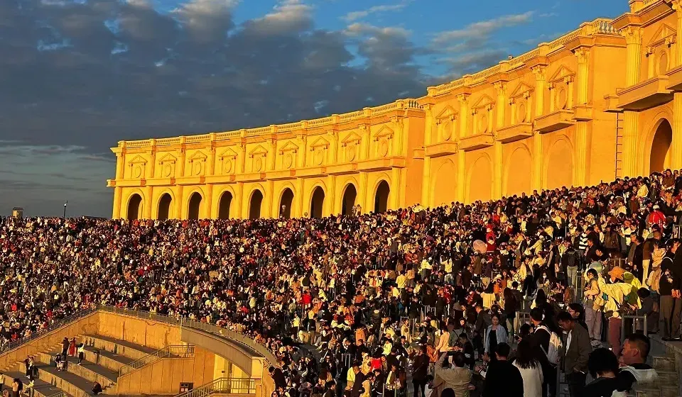 Lanshan Park’s golden arches filled with sunset watchers